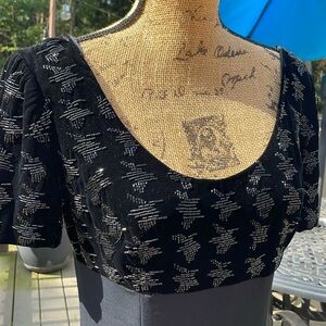 Niteline. Della Rofougali size 6-ish see measurements